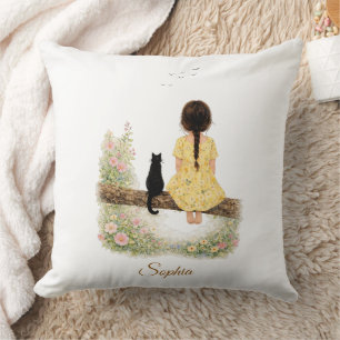 Coussin Fille et chat noir sur une branche