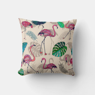 Coussin flamigos roses et feuilles tropicaux sans couture 
