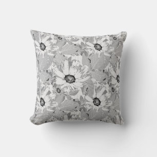 Coussin Fleurs blanches sur gris clair.