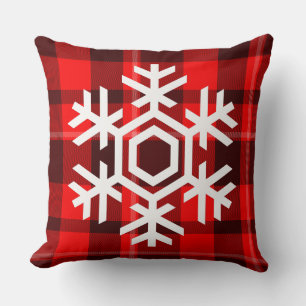 Coussin Flocon de neige blanc sur un motif de tartan rouge