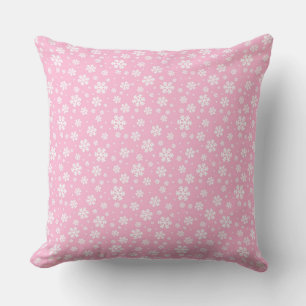 Coussin Flocons blancs sur motif d'hiver rose clair
