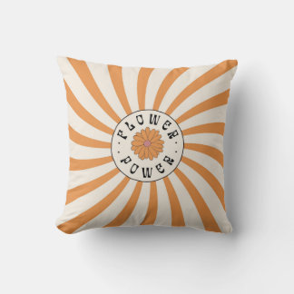 Coussin Flower Power avec des rayons orange psychédéliques