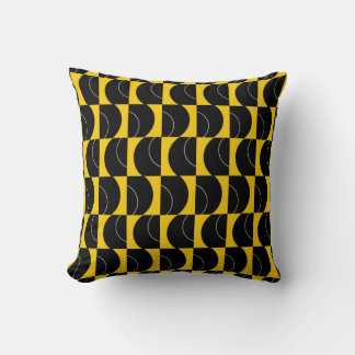 Coussin géométrique noir et jaune à orbite dorée