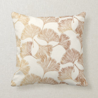 Coussin Gingko or feuille sur papier peint crème toile ivo