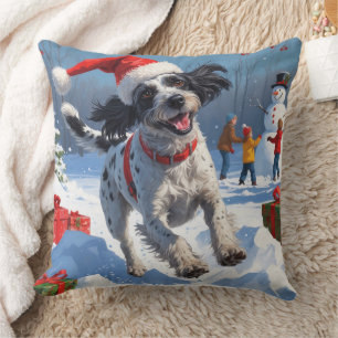 Coussin Griffon à poil dur avec un chapeau de Noël enneigé
