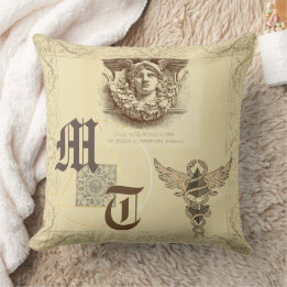 Coussin Hermes antique baroque élégant monogramme