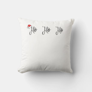 Coussin Ho Ho Ho portant un chapeau de santa rouge