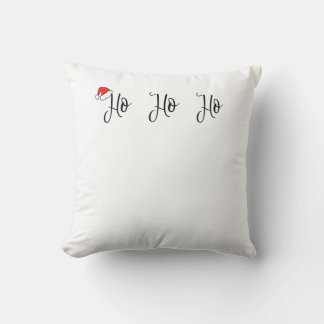 Coussin Ho Ho Ho portant un chapeau de santa rouge