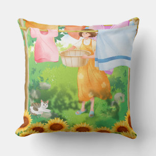 Coussin Jolie fille suspendant du linge dans un jardin de