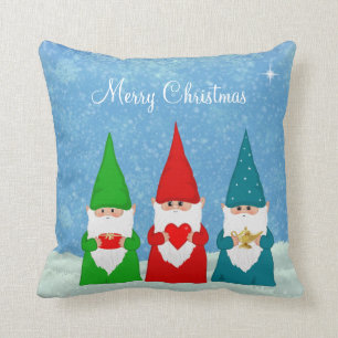 Coussin Jolis nains de Noël habillés en bleu, rouge et ver