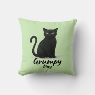 Coussin Jour de grumeaux avec chat noir