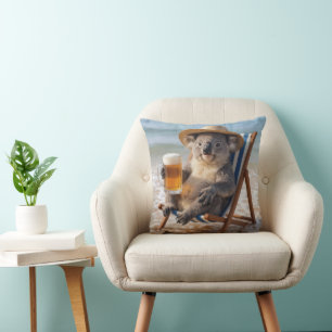 Coussin Koala avec une bière sur une plage