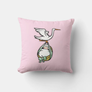 Coussin La cigogne porte une petite fille