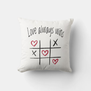 Coussin L'amour gagne toujours