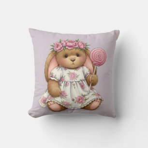 Coussin Lapin dans une robe blanche avec une Lollipop rose