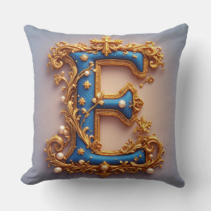 Coussin Lettre E bleue ornée
