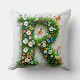 Coussin Lettre élégante R formée de fleurs colorées