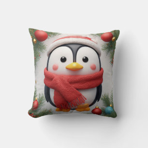 Coussin Manchot festif décoré d'ornements de fêtes