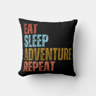 COUSSIN MANGER DORMIR AVENTURE RÉPÉTER