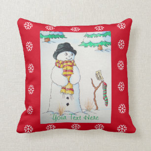 Coussin mignon bonhomme de neige souriant sur la scène de