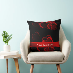 Coussin modèle de texte noir avec cœur rouge