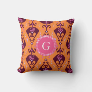 Coussin monogramme de motif tribal ikat à poule orange chi