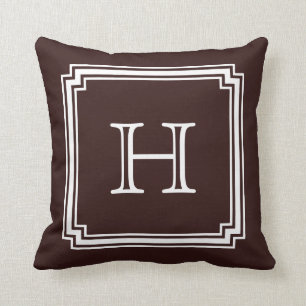 Coussin Monogramme faisant le coin entaillé d'arrière -