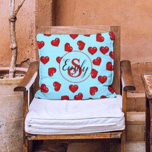 Coussin monogrammed motif de coeur rouge sur bleu turquois