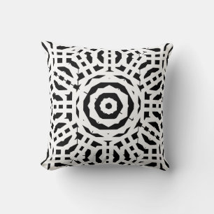 Coussin Motif abstrait noir et blanc sur fond uni
