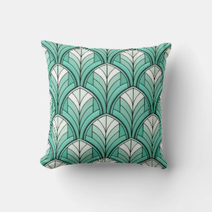 Coussin motif art déco avec des teintes sarcelle, blanche 