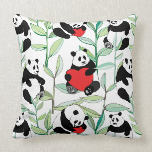 Coussin motif avec de beaux pandas avec des coeurs