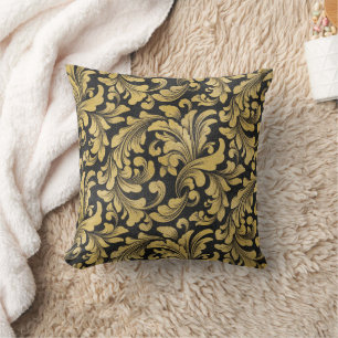 Coussin Motif baroque fleuri or sur arrière - plan noir