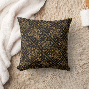 Coussin Motif baroque ornemental doré sur fond noir