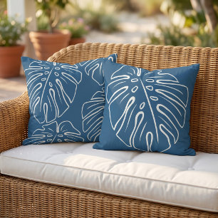 Coussin Motif de feuille tropicale blanche sur fond bleu c