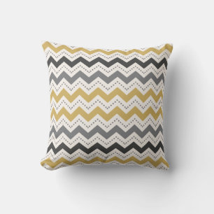 Coussin motif gris et doré de chevron et de points