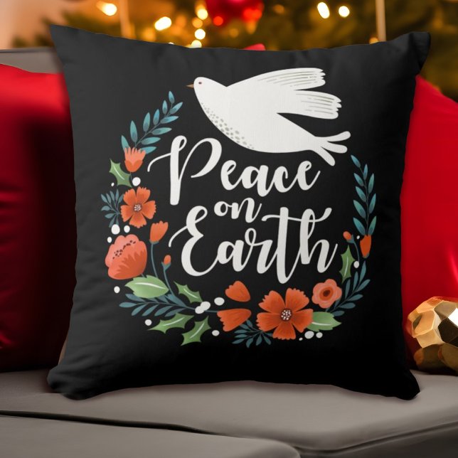 Coussin Noël Paix sur terre (An elegant Christma s pillow featuring the words, peace on earth, and a dove)