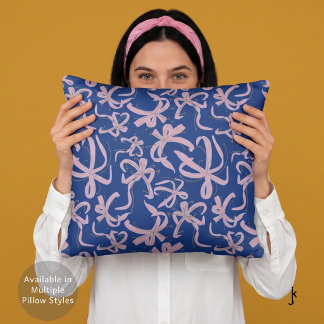 Coussin Nœuds de ruban rose élégant sur fond bleu foncé
