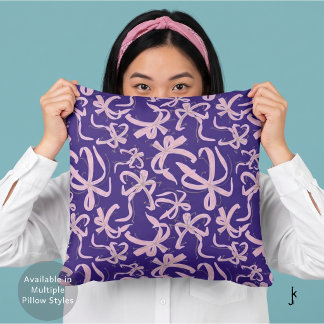 Coussin Nœuds de ruban rose élégants sur fond violet foncé