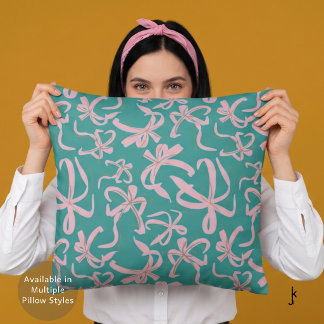 Coussin Nœuds ruban rose élégant sur fond sarcelle