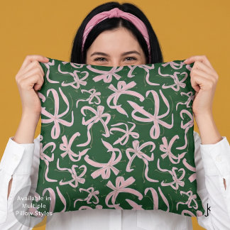 Coussin Nœuds ruban rose élégant sur fond vert pin foncé