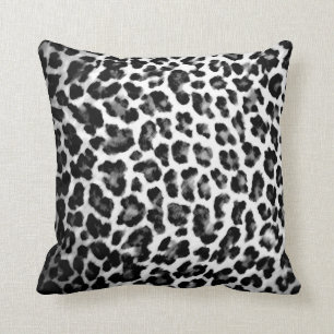 Coussin noir et blanc d'empreinte de léopard