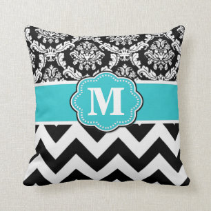 Coussin noir turquoise de monogramme de Chevron de
