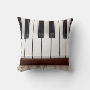 Coussin notes musicales sur l'arrière - plan d'une pianoac