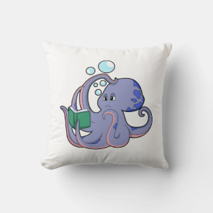 Coussin Octopus à la lecture avec livre