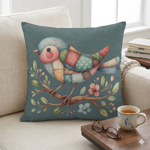 Coussin Oiseau chanteur patchwork sur branche fleurie
