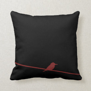 Coussin Oiseau noir et rouge