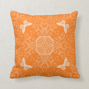 Coussin Orange vintage de regard de médaillon de papillon