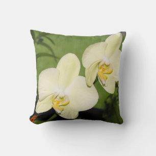 Coussin Orchidées blanches sur un arrière - plan vert