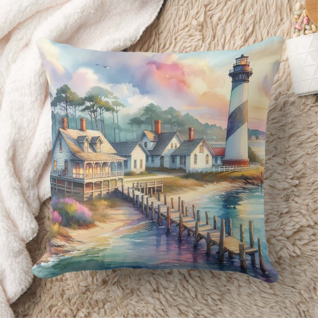 Coussin Phare côtier et chalets de plage Scène (Couverture)