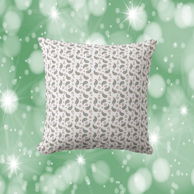 Coussin Pois Fleurs Paisley Rose vert Motif violet (A throw pillow with a pattern of paisley, flowers and polka dots done in green, pink, purple & blue.)
